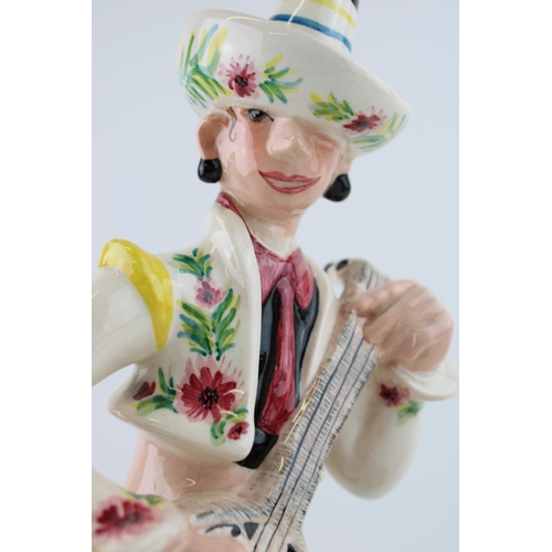 57 - Goldscheider figure of a Mexican Musician, printed marks 'Goldscheider Staffordshire', 30cm tall.