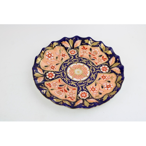 62 - A trio of cabinet plates to include an antique imari fluted plate, impressed Morley, a Doulton Bursl... 