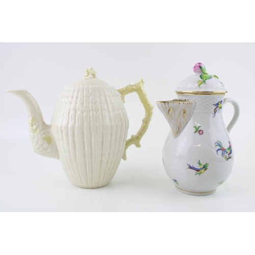 64 - A Belleek coffee pot with crustacean style handle with a Herend coffee pot / hot water jug (latter a... 