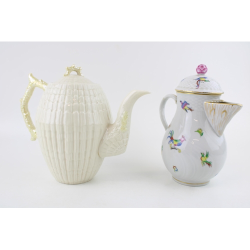 64 - A Belleek coffee pot with crustacean style handle with a Herend coffee pot / hot water jug (latter a... 