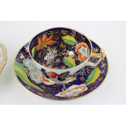 65 - A Coalport cup and saucer, imari style decoration, circa 1895, with an unmarked cup and saucer, John... 