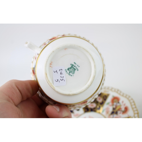 65 - A Coalport cup and saucer, imari style decoration, circa 1895, with an unmarked cup and saucer, John... 