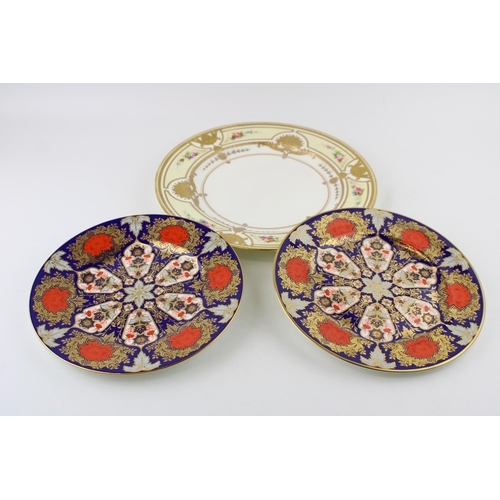 68 - A near pair of Lynton Derby Imari plates, circa 21cm diameter, with a restored Minton jewelled cabin... 