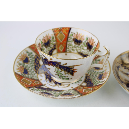 69 - A Flight Barr and Barr cup and saucer, circa 1820, with a Newhall cup and saucer, circa 1805, and a ... 