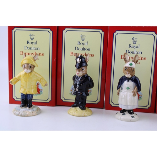 239 - Boxed Royal Doulton Bunnykins figures to include Policeman, Nurse, Father Mother & Victoria colourwa... 