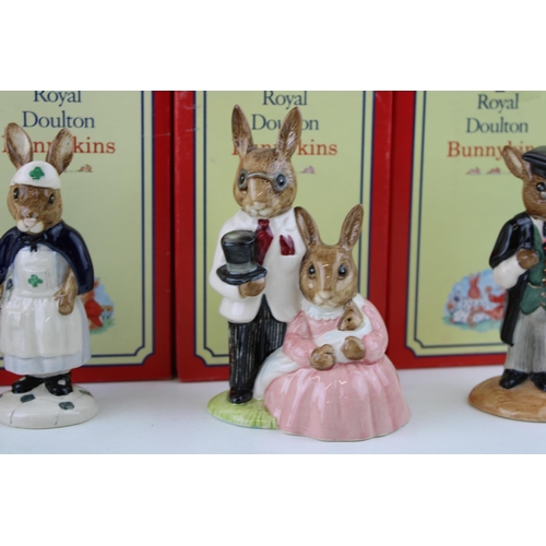 239 - Boxed Royal Doulton Bunnykins figures to include Policeman, Nurse, Father Mother & Victoria colourwa... 