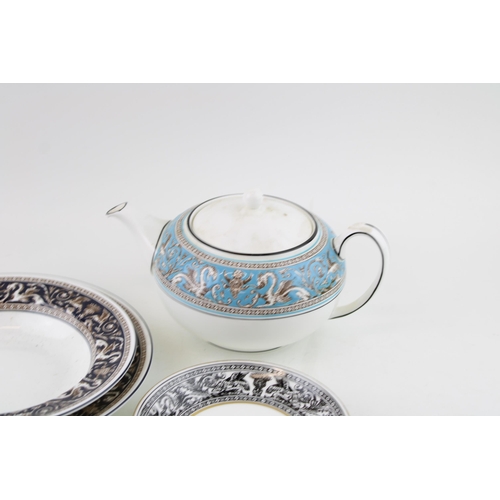 266 - Wedgwood Florentine items to include Turquoise teapot, dinnerware items and a saucer. (5).