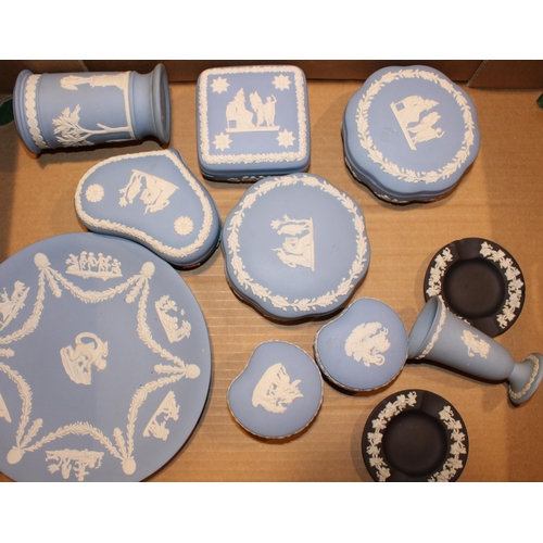 273 - A collection of Wedgwood Jasperware items to include pin trays and lidded pots in Wedgwood Blue, Sag... 