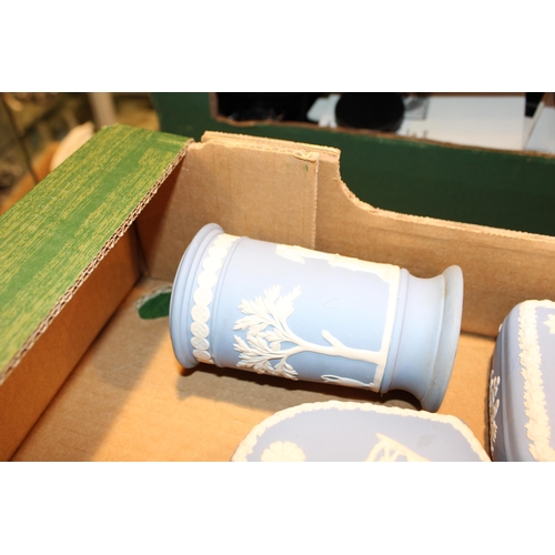 273 - A collection of Wedgwood Jasperware items to include pin trays and lidded pots in Wedgwood Blue, Sag... 