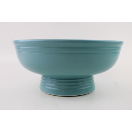 283 - Keith Murray for Wedgwood: an Art Deco footed bowl in matt blue. Stamped to the base. Diameter: 26cm... 