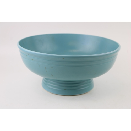 283 - Keith Murray for Wedgwood: an Art Deco footed bowl in matt blue. Stamped to the base. Diameter: 26cm... 