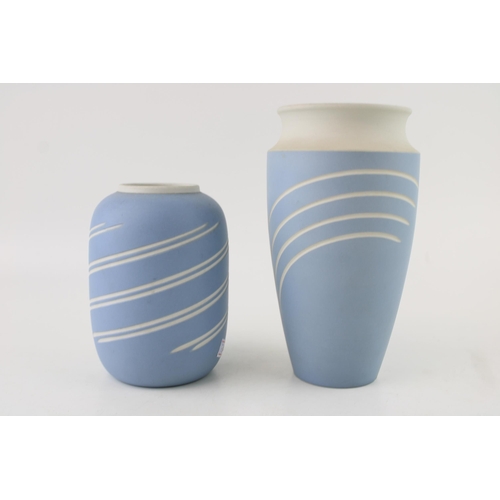 285 - Two Wedgwood Jasperware 'Symmetry' range vases in Wedgwood Blue. Height 17cm. (2)