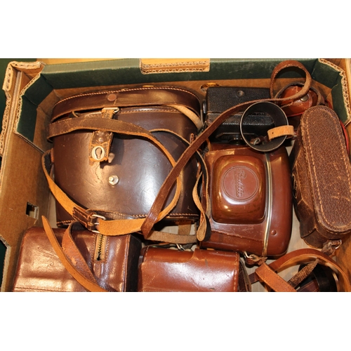 303 - A collection of vintage camera equipment and a pair of binoculars by Ross '9x35 Stepruva'. Camera eq... 