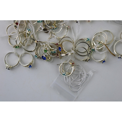 310 - A collection of costume jewellery to include rings, necklaces and charms. (Qty)