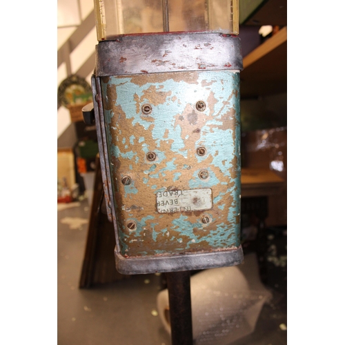 315 - A vintage gumball / sweet dispenser, cast iron base with perspex case sitting in cast aluminium surr... 