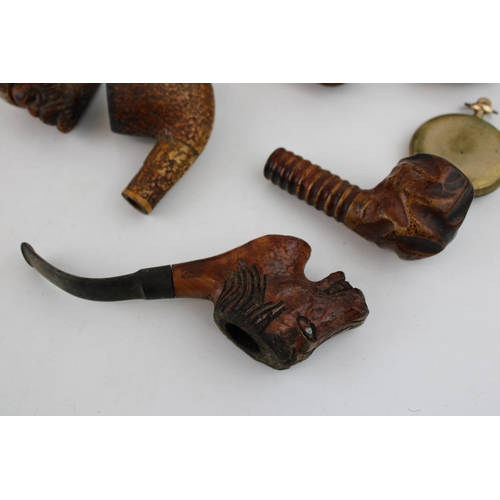 324 - A collection of briar and hand carved tobacco pipes together with a Waltham full hunter pocket watch... 