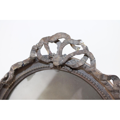 325 - An oval 19th century brass picture frame together with another example with gilt example a/f. 34cm x... 