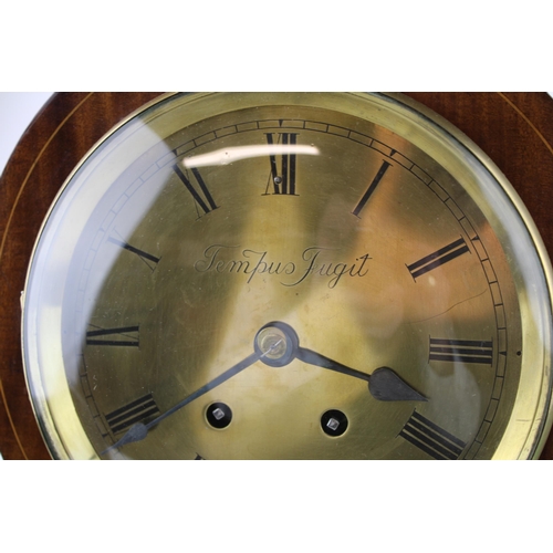 327 - A French Edwardian inlaid mahogany balloon mantle clock, Brass dial with Roman numeral hour markers.... 