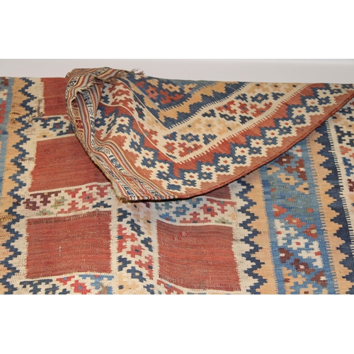 341 - A traditional hand knotted vintage Kilim carpet, natural dyes in reds, oranges, blues and greens. 27... 