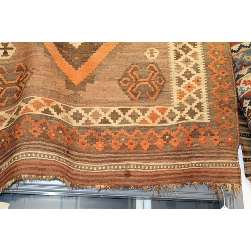 342 - A traditional hand knotted vintage Kilim carpet, natural dyes in browns, oranges and creams. 270cm x... 