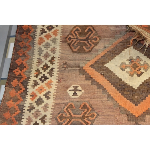 342 - A traditional hand knotted vintage Kilim carpet, natural dyes in browns, oranges and creams. 270cm x... 