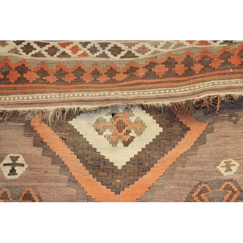 342 - A traditional hand knotted vintage Kilim carpet, natural dyes in browns, oranges and creams. 270cm x... 