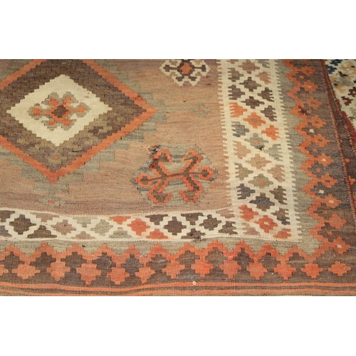 342 - A traditional hand knotted vintage Kilim carpet, natural dyes in browns, oranges and creams. 270cm x... 