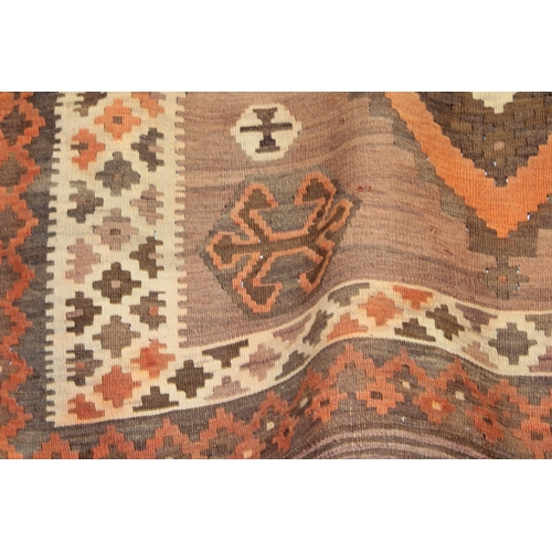 342 - A traditional hand knotted vintage Kilim carpet, natural dyes in browns, oranges and creams. 270cm x... 