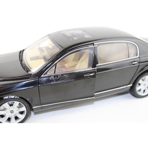 416 - Paul's Model Art or similar 'Minichamps' Bentley Continental Flying Spur in black, 1/18 scale.