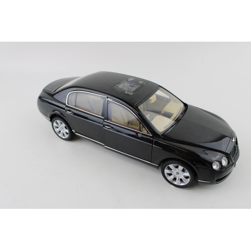 416 - Paul's Model Art or similar 'Minichamps' Bentley Continental Flying Spur in black, 1/18 scale.