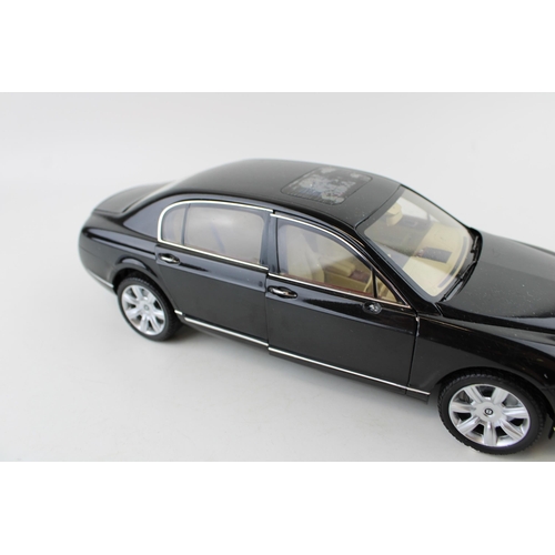 416 - Paul's Model Art or similar 'Minichamps' Bentley Continental Flying Spur in black, 1/18 scale.