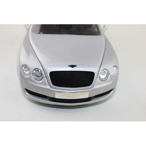 418 - Paul's Model Art 'Minichamps' Bentley Continental Flying Spur, detailed die cast model vehicle in si... 