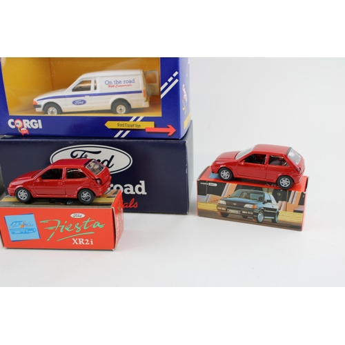 424 - A Schabak 1:35 scale Ford Transit Van No 1300 / 1301 in red together with a Corgi Ford Escort Van 'O... 