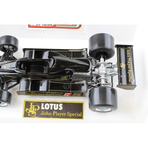 427 - A boxed die cast  Polistil Lotus John Player Special 1/18 scale F1 car. Width 29cm.