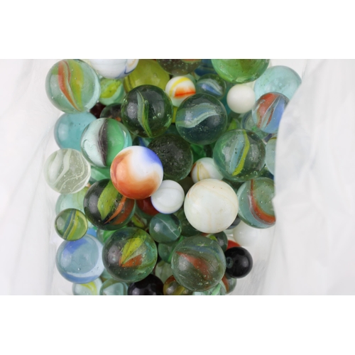 433 - A collection of vintage marbles of varying ages.