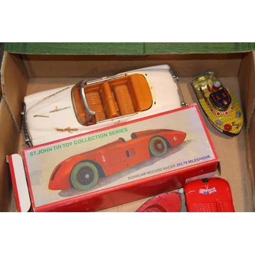 437 - A collection of reproduction vintage style tinplate toys to include a Sunbeam Record Racer, Torpedo ... 