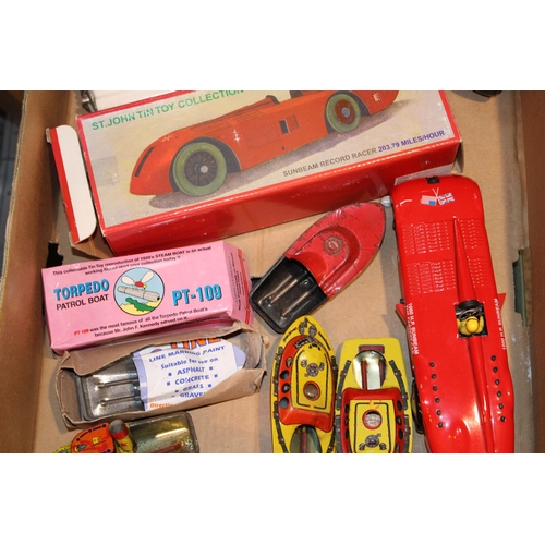 437 - A collection of reproduction vintage style tinplate toys to include a Sunbeam Record Racer, Torpedo ... 