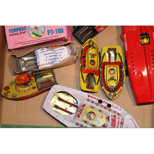 437 - A collection of reproduction vintage style tinplate toys to include a Sunbeam Record Racer, Torpedo ... 