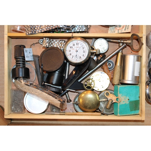 550 - A collection of watchmakers and jewellers tools together with wristwatch and pocket watch parts and ... 