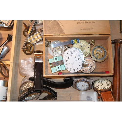 550 - A collection of watchmakers and jewellers tools together with wristwatch and pocket watch parts and ... 