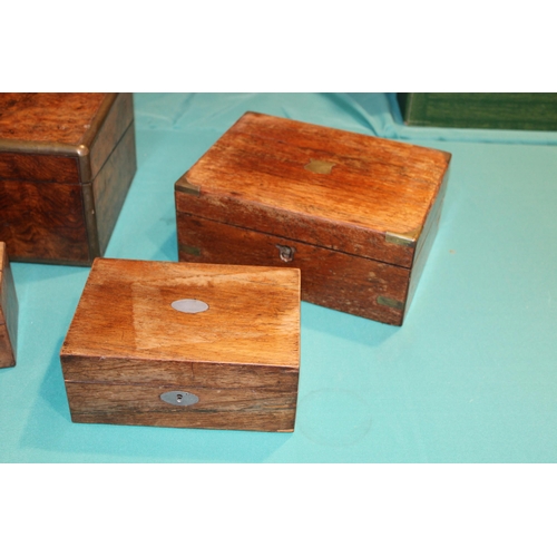 553 - A collection of c19th Victorian Wooden boxes to include a very large walnut and brass bound writing ... 