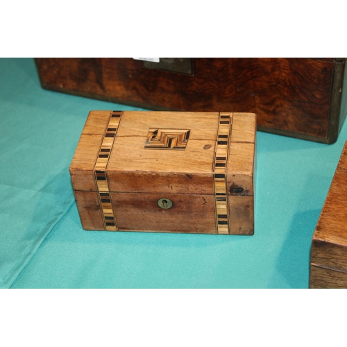 553 - A collection of c19th Victorian Wooden boxes to include a very large walnut and brass bound writing ... 