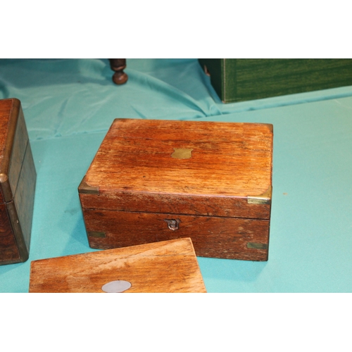 553 - A collection of c19th Victorian Wooden boxes to include a very large walnut and brass bound writing ... 