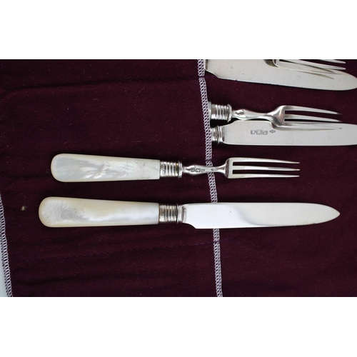 565 - Set of mother of pearl handled sterling silver ferruled knives and forks. London, 1903 by Sibray, Ha... 