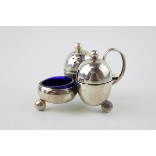 578 - Silver breakfast condiment set, Sheffield 1902, Thomas Bradbury & Son, blue glass liners, acorn form... 