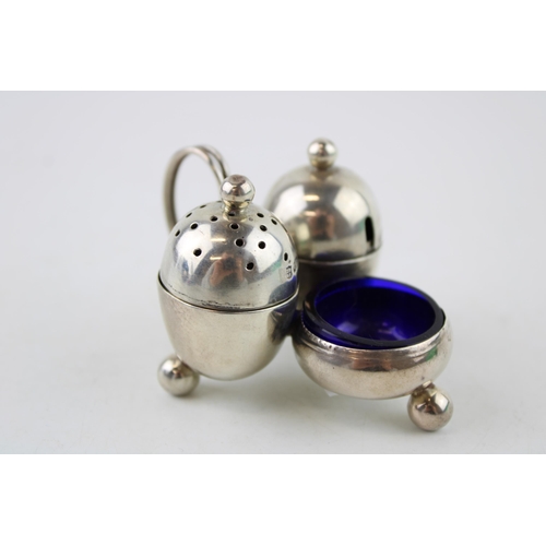 578 - Silver breakfast condiment set, Sheffield 1902, Thomas Bradbury & Son, blue glass liners, acorn form... 