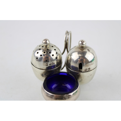 578 - Silver breakfast condiment set, Sheffield 1902, Thomas Bradbury & Son, blue glass liners, acorn form... 