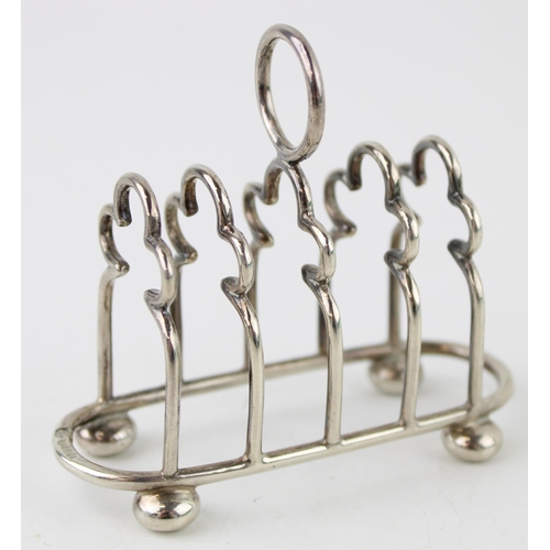 579 - Hallmarked silver small toast rack, Sheffield 1903, JD&WD, 38.0g, 8cm long.