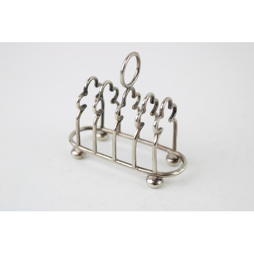 579 - Hallmarked silver small toast rack, Sheffield 1903, JD&WD, 38.0g, 8cm long.