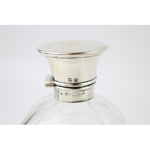 581 - Silver and glass perfume bottle, Birmingham 1922, Syner & Beddoes, with stopper, 12cm tall.